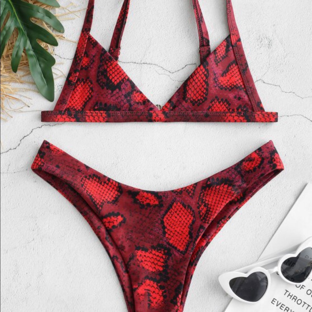Triangle bikini red snake skin. Never been worn.